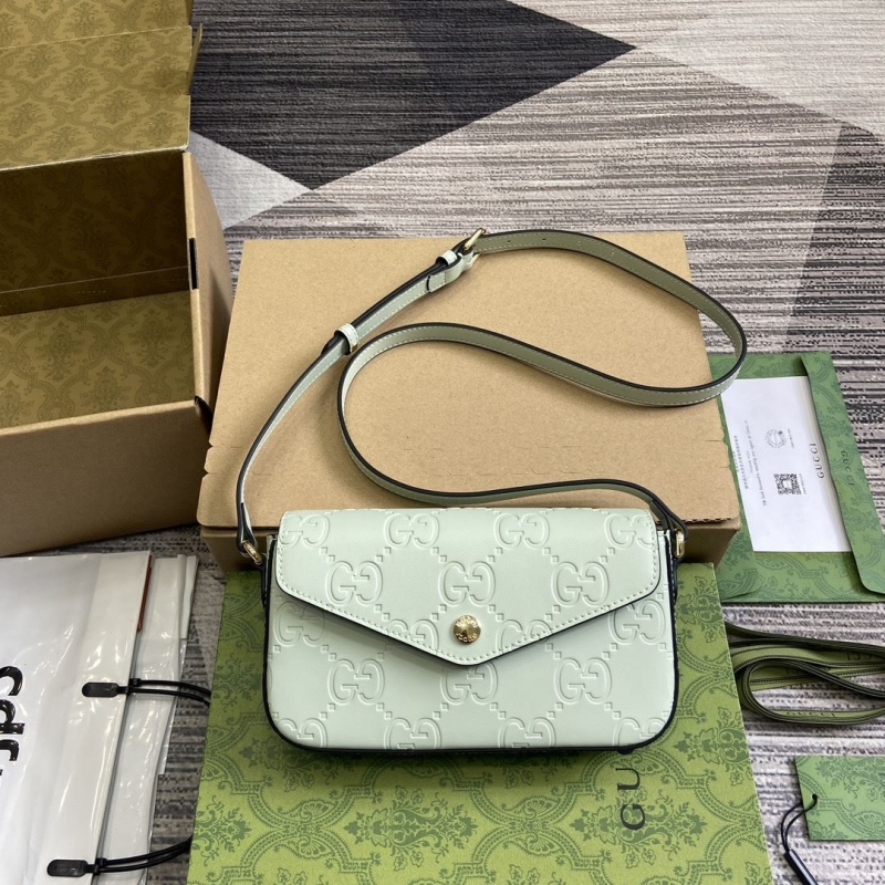 G*u*i satchel bags